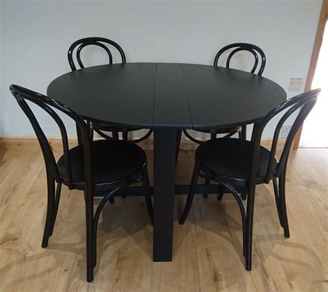 Ikea round drop leaf table & 4 chairs black ash | in Hampton, London ...