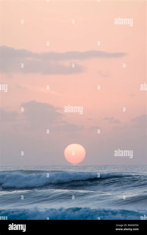 Sunrise over Indian ocean Stock Photo - Alamy