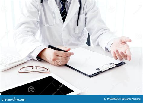 Doctor Working in Hospital with Stethoscope Stock Photo - Image of notebook, people: 195038236