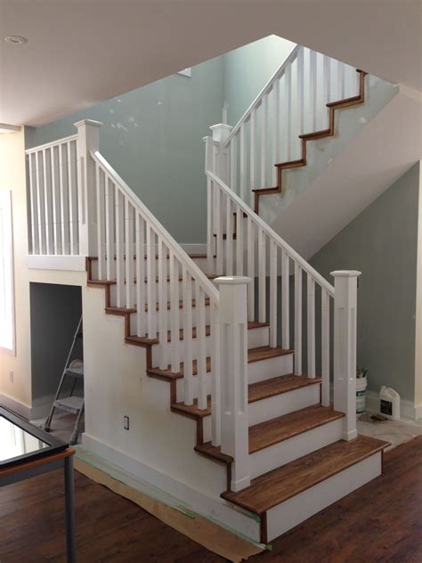 Custom built open concept stairs by Hall Designs, finished with medium ...