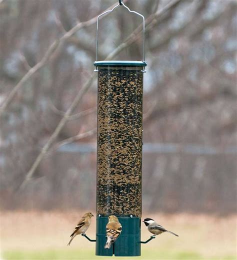 The Magnet Squirrel-Proof Feeder features four, weight-activated ...