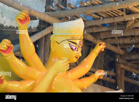 Clay idol of Goddess Durga under preparation for Durga Puja festival in ...