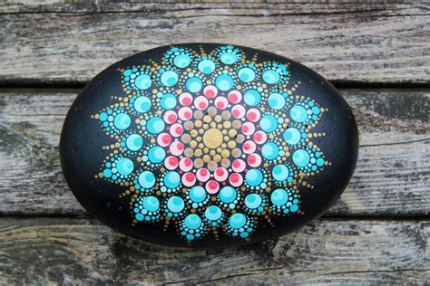 One of my favourite mandalas I've done on a rock | Mandala painted rocks, Rock painting patterns ...