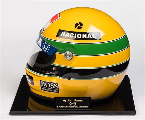 SENNA: A full size replica of the F1 racing helmet worn by Ayrton Senna and painted by Sid Mosca ...