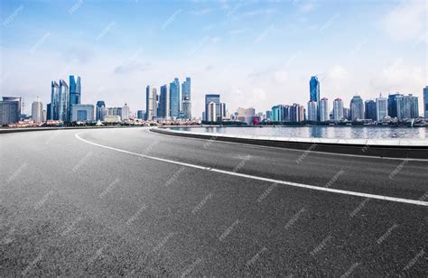 Premium Photo | The expressway and the modern city skyline are in qingdao, china.