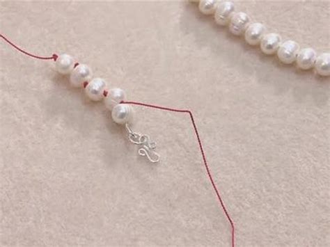 How To Knot Pearls On A String - YouTube