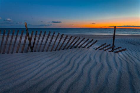 Download Fence Horizon Sunset Beach Sand Photography Ocean HD Wallpaper