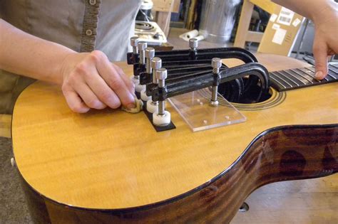 How to Repair a Bridge on an Acoustic Guitar | Robots.net