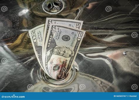 Money Down Drain Stock Images - Download 336 Royalty Free Photos