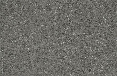 Full frame image of cement or concrete exterior wall surface. High resolution seamless texture ...