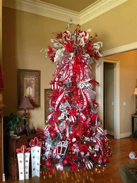 Red and White Candy Cane theme Christmas tree | Holiday christmas tree, Candy christmas tree ...