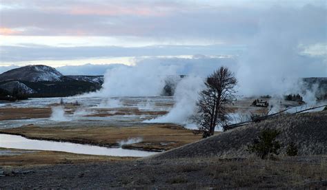 Hot springs and Geysers in Yellowstone Photograph by Pierre Leclerc Photography - Fine Art America