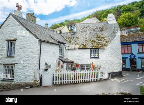 Characterful whitewashed cottages at the coastal village of Polperro ...