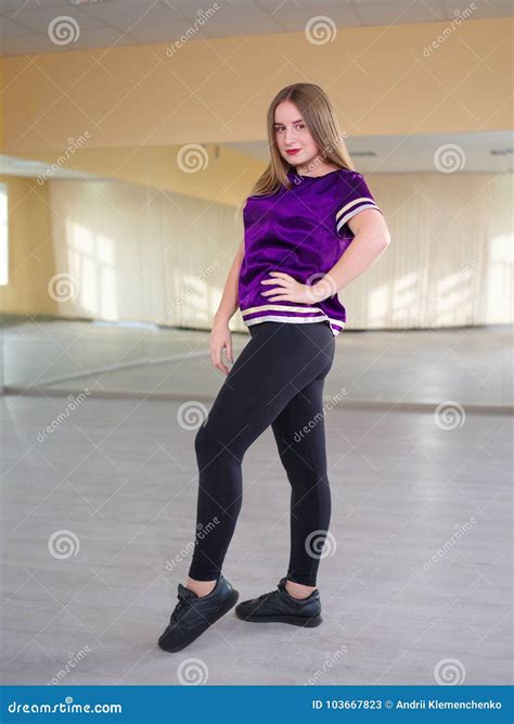 Cute Girl, Brunette, Standing Sideways Posing in a Light Dance Studio Stock Image - Image of ...