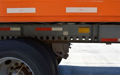 🎢 Sliding the tandem axle group along a trailer to adjust the weight ...