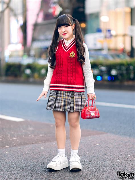 Harajuku Girl in Kawaii Pink House Street Style w/ Plaid Skirt, Knit Vest, Hello Kitty Bag ...