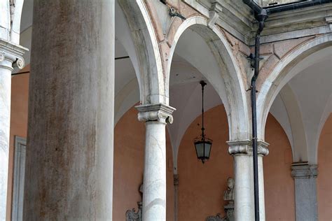 Detail of portico with arches and columns Photograph by Oana Unciuleanu