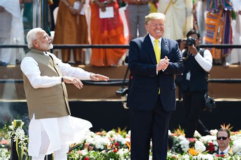 Donald Trump Enters Packed India Stadium as Village People's 'Macho Man' Blares Out During Rally ...