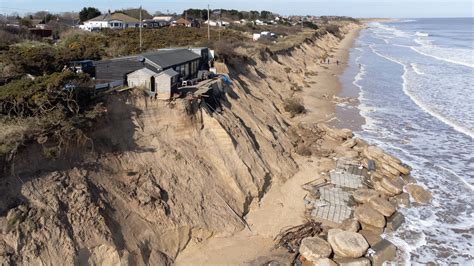 Demolition of houses along Norfolk coastline as erosion takes its toll | UK News | Sky News