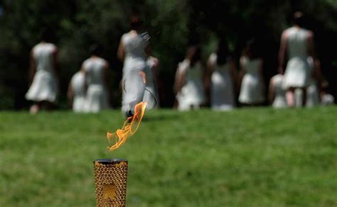 Images: Lighting ceremony of Olympic flame - Photos News , Firstpost