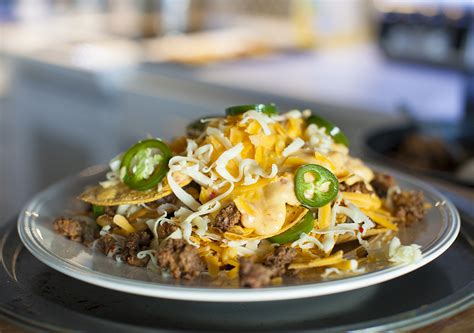 super bowl nachos - the perfect pregame activity - bite