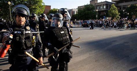 Photos Show Louisville Protesters Shielding Police Officer Separated ...