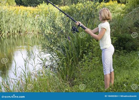 Little Girl Fishing On Lake Stock Images - Image: 18408384