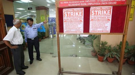 Indian workers strike over Modi labour reforms - BBC News