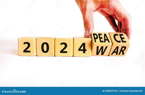 2024 War or Peace Symbol. Businessman Turns a Wooden Cube and Changes ...