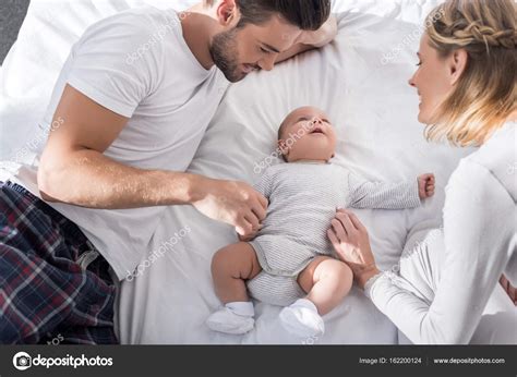 Parents with cute baby boy — Stock Photo © AllaSerebrina #162200124