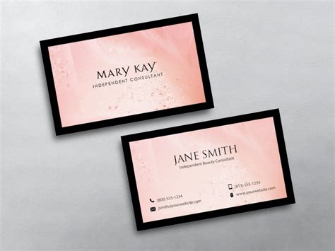 two business cards with pink and black accents