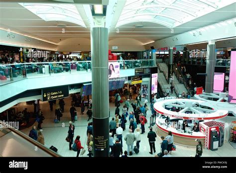 Shops and restaurants in departure lounge of Gatwick Airport South ...