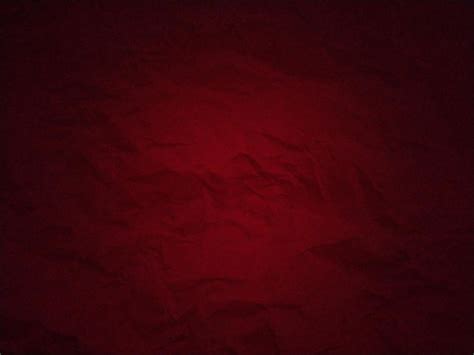 Premium Photo | Dark red background with uneven spots and vignetting Crumpled thick paper ...