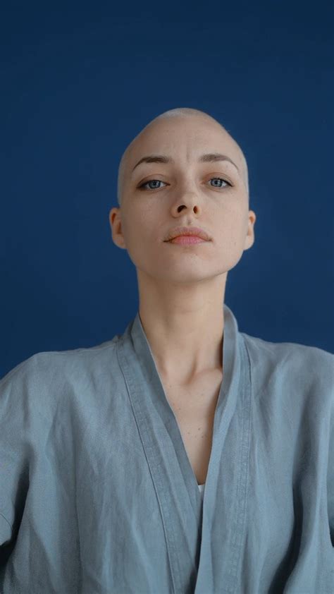 Free stock video of bald, battle against cancer, blue background