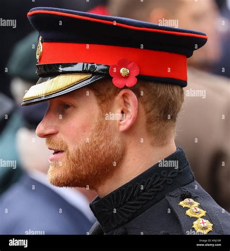 His Royal Highness Prince Harry lays a Cross of Remembrance in front of ...