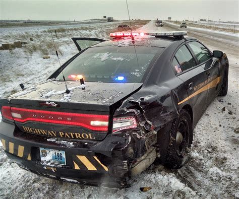 Wyoming: Highway Patrol reports two patrol cars hit and asks for folks to slow down in bad ...