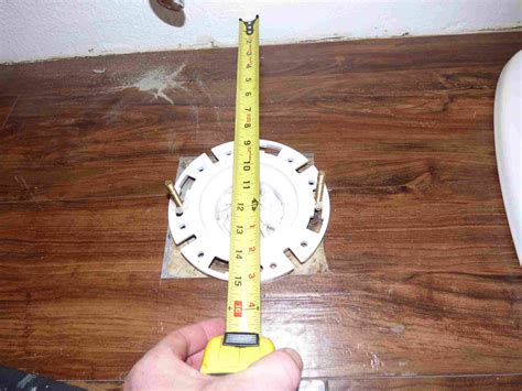 How to Install a New Toilet Flange on a Concrete Slab