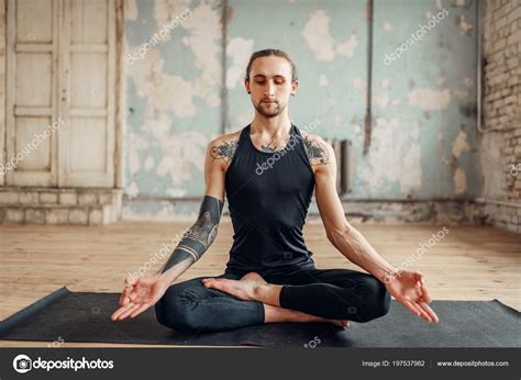 Young Man Meditating Lotus Pose Stock Photo by ©Nomadsoul1 197537982