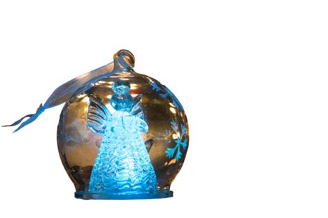Softfocused Christmas Lights Shine On Angel Figure Enclosed In Glass Bulb, Decoration, Present ...