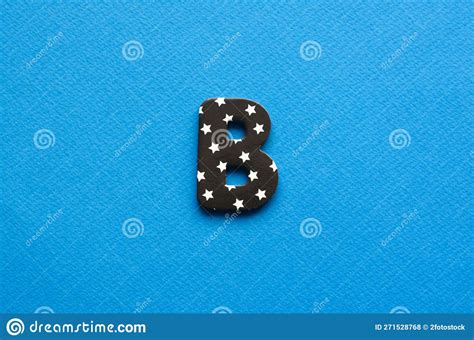 Letter B on Blue Paper Background. Stock Photo - Image of orange ...