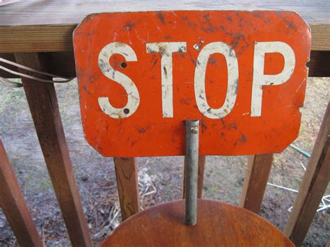 Stop sign backed with slow sign, hand held rectangular flagger or school crossing, 50's by ...