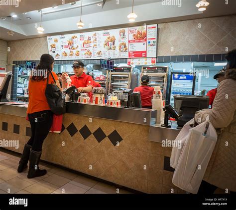 A KFC franchise restaurant in the food court of the Queens Center Mall ...