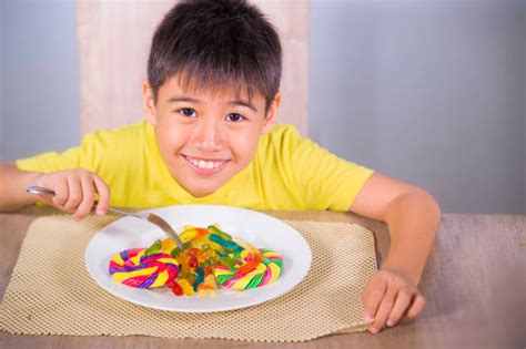 20+ Child Eating Candy Sugar Abuse And Unhealthy Sweet Nutrition ...