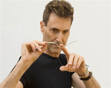 Uri Geller performs trademark trick of spoon bending for Benidorm set - Daily Star