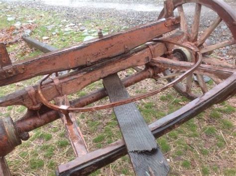 Lot Detail - ANTIQUE WOODEN WAGON WHEEL PAIR WITH AXLE