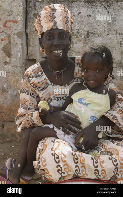 Gambia traditional clothing hi-res stock photography and images - Alamy