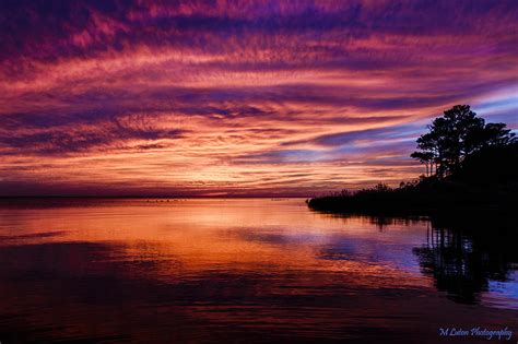 Orange and Purple Sunset Photograph by M Luton - Fine Art America