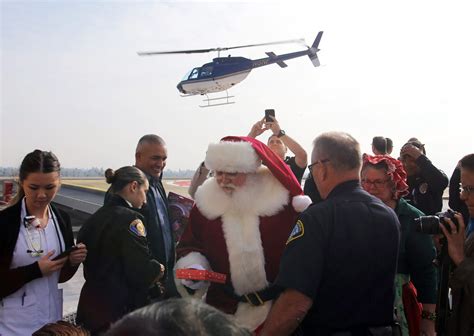 Santa delivers gifts with the help of Pasadena PD helicopter - Behind the Badge