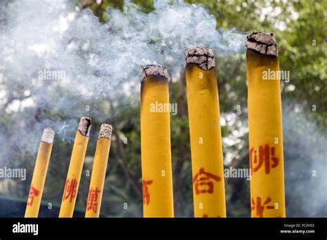 Giant Burning Incense sticks Stock Photo - Alamy