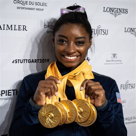 Olympics Gold Medal Simone Biles - Simone Biles Works Out And Walks Dog ...